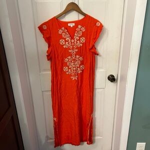 THML boutique dress. Only worn once. Orangeish red color with tan stitching.